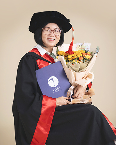 PhD graduation portrait of a graduate in a minimalist studio in Selangor